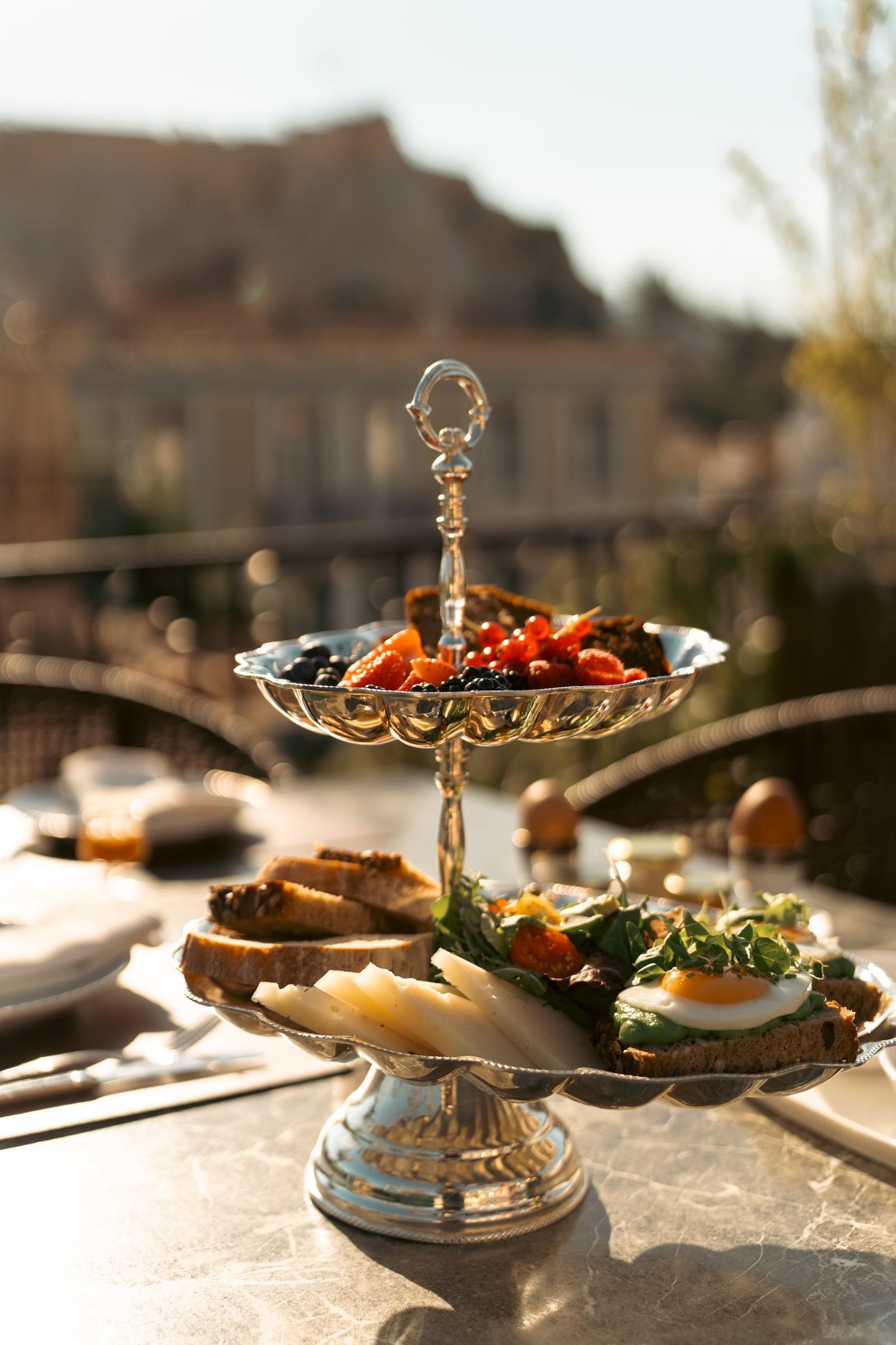 Breakfast stand on the rooftop with the Acropolis behind
