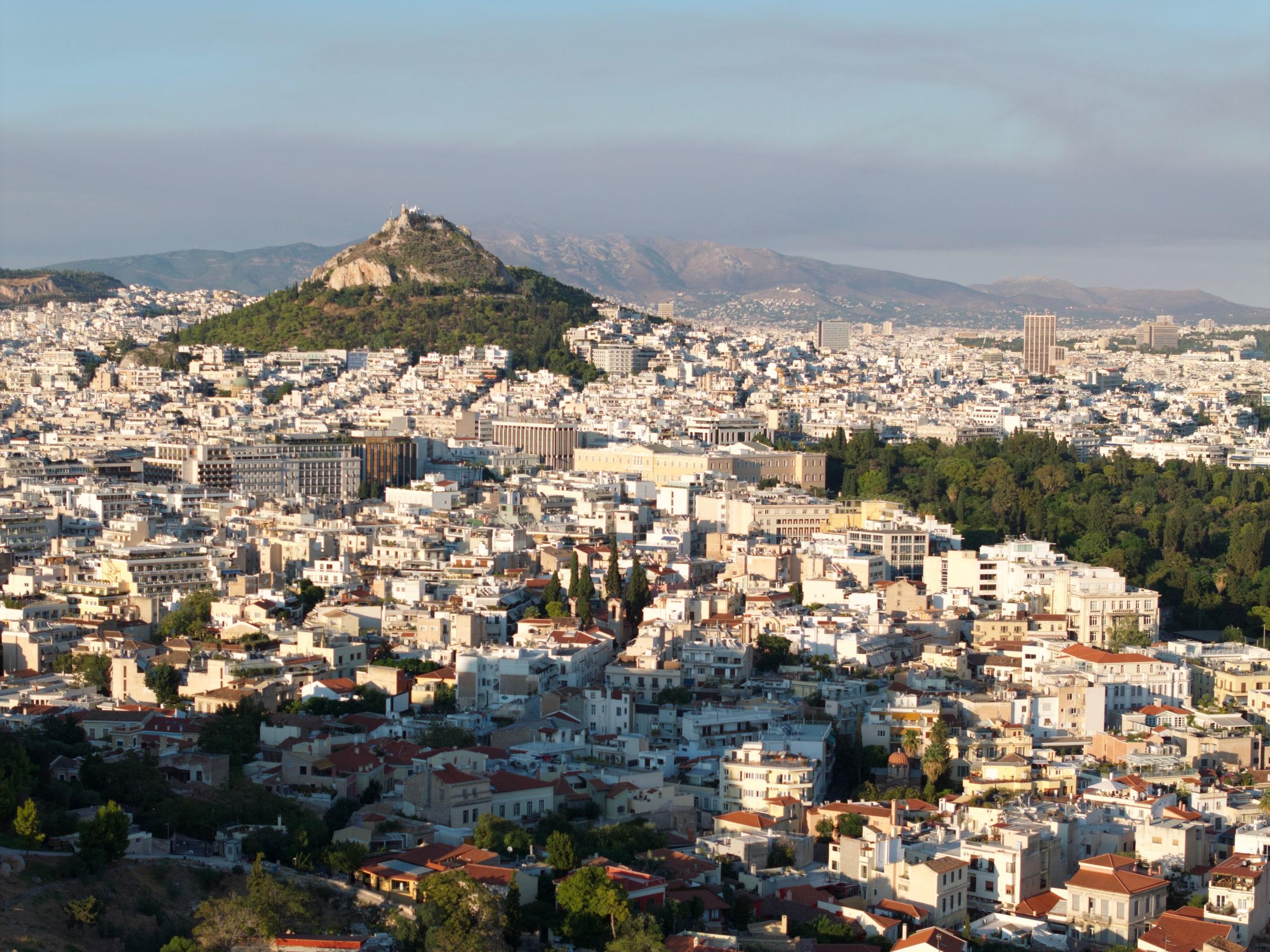 Plaka from above, with Lycabettus hill in the distance